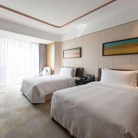 The Qube Hotel Jingzhou Bagian luar foto