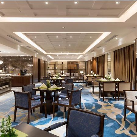 The Qube Hotel Jingzhou Bagian luar foto
