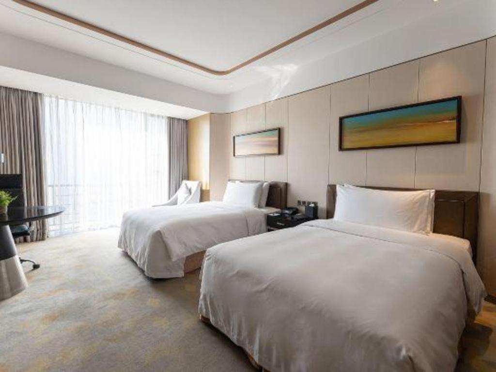 The Qube Hotel Jingzhou Bagian luar foto