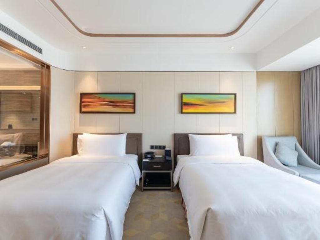 The Qube Hotel Jingzhou Bagian luar foto