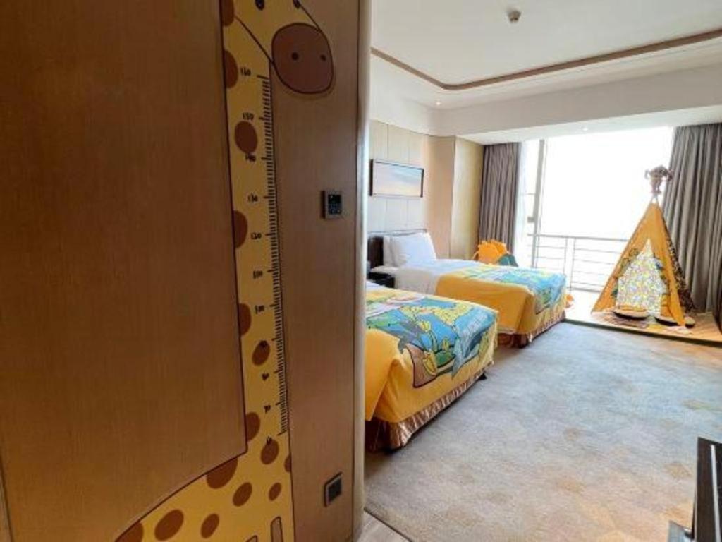 The Qube Hotel Jingzhou Bagian luar foto