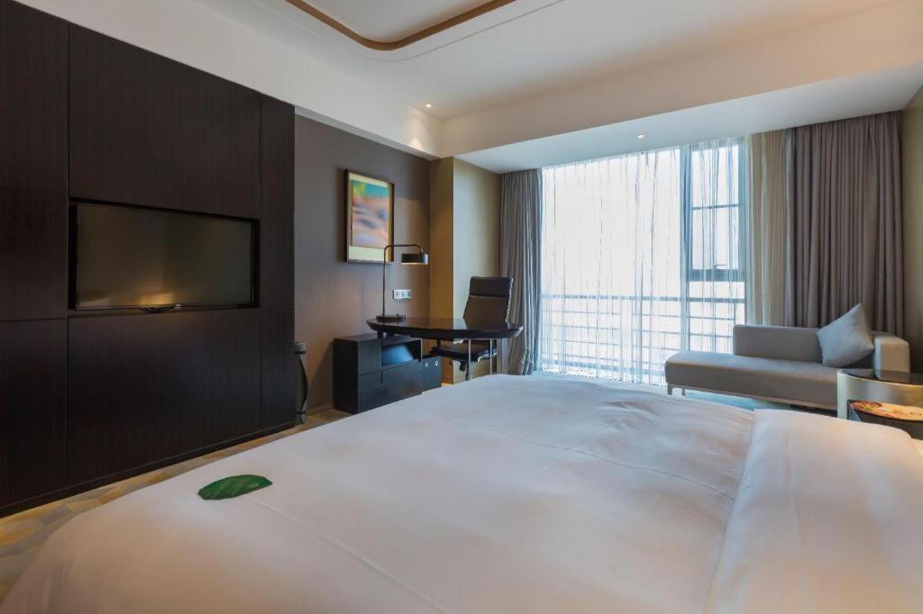 The Qube Hotel Jingzhou Bagian luar foto