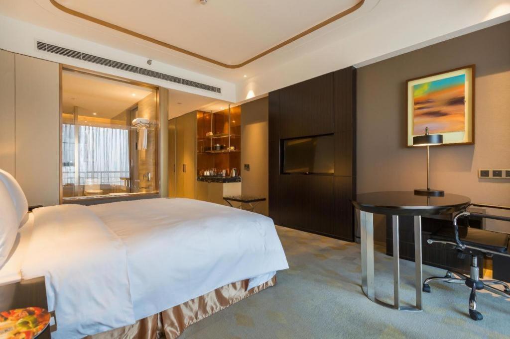 The Qube Hotel Jingzhou Bagian luar foto