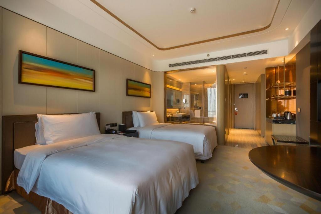 The Qube Hotel Jingzhou Bagian luar foto