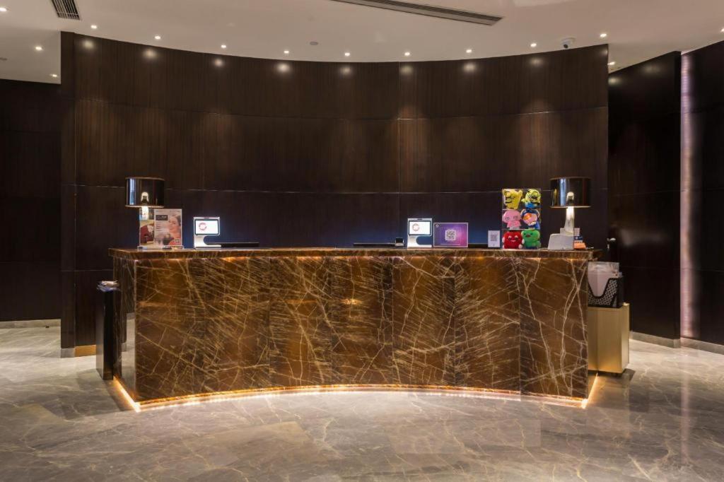 The Qube Hotel Jingzhou Bagian luar foto