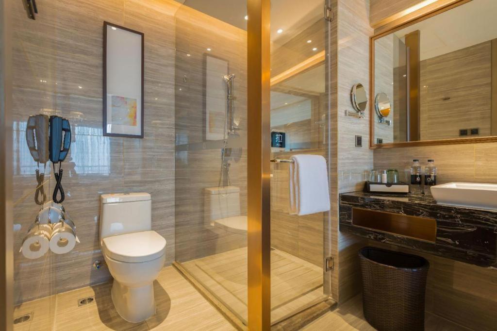The Qube Hotel Jingzhou Bagian luar foto